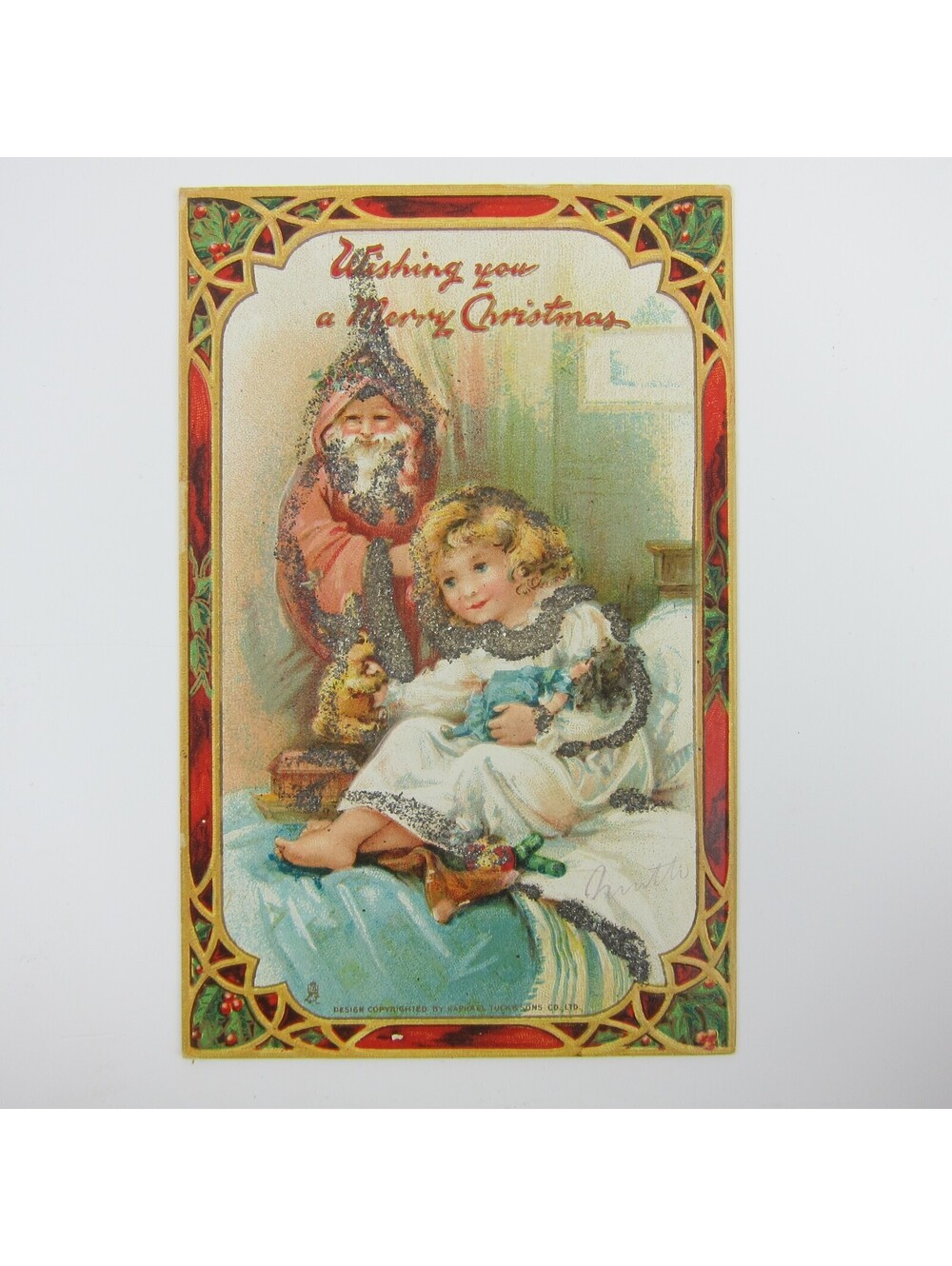 Christmas Postcard Old World Santa Girl Bed Toys Doll Bunny Rabbit Tuck Antique